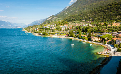 Fototapeta na wymiar Town of Malcesine on Lago di Garda skyline view, Veneto region of Italy. Aerial view, top view