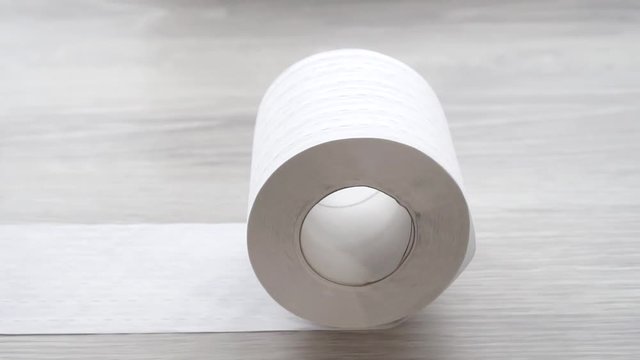 Concept idea toilet paper with perforation rolls close up,slow mo