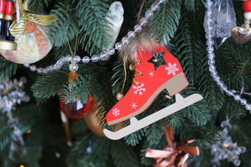 wooden toy skates on the Christmas tree