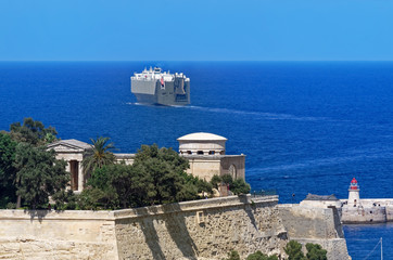 Scene of ferry leaving a harbor of Valletta on Malta