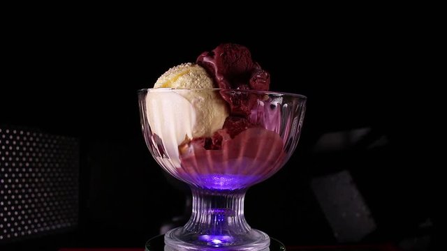 Chocolate vanilla and fruit ice cream in bowl sundae