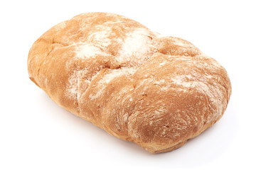 Fresh whole grain bread, isolated on white background. Close-up.