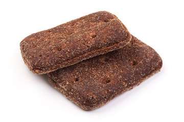 Rye cracker snack bread, isolated on white background. Close-up