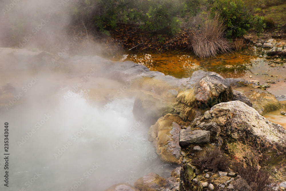 Wall mural smoking fumarole and water spring in geothermal area in furnas azores, portugal