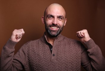 Beautiful man in front of a colored background