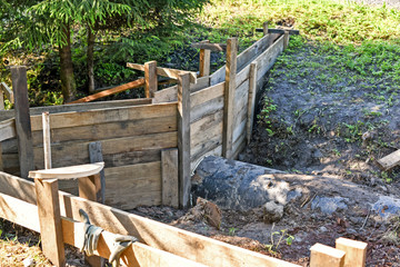 Laying formwork, concrete beams for the construction of the fence.