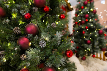 Beautiful Christmas tree with fairy lights and festive decor, closeup