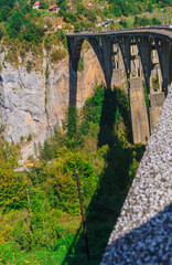 Concrete arch bridge Durdevitsa-Tara across the Tara river canyon in Montenegro. September 2018