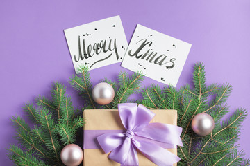 Christmas composition tree branches craft gift balls lettering