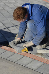 cutting the paving stones