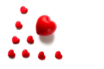 Love concept - composition of red hearts isolated on white background. Copy space for text.