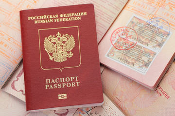 Russian passports and visa immigration stamps. Background of documents