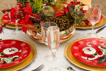 Fototapeta na wymiar Christmas table setting for celebration at home.