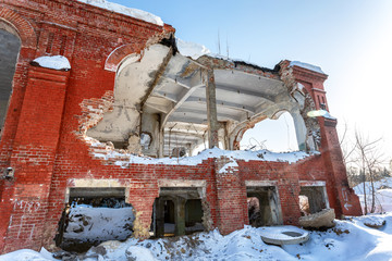 Old abandoned and destroyed building from red brick