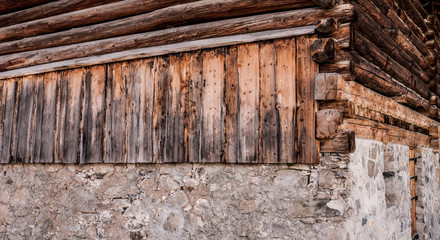 Close up view of the structure of a log cabin, taken in Lech, Austria