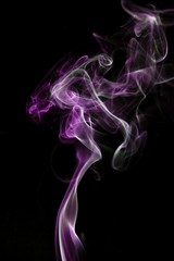 Two color smoke isolated on black background