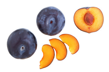 plums isolated on a white background. Top view. Flat lay pattern