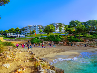 People doing yoga exercises outdoor on the beach  in Palma Mallorca Island, Spain © cristianbalate