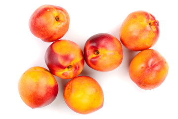 ripe nectarine with leaves isolated on white background. Top view. Flat lay pattern