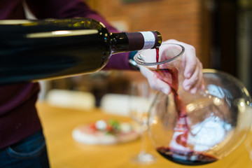 Pouring the Wine in Decanter
