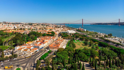 Lisbon roofs, tagus river and 25th april bridge