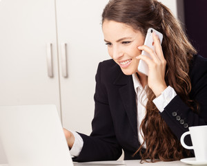 young attractive business woman talking on phone iPhone X