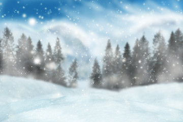 Fototapeta premium Winter background with blurred landscape with flying snow