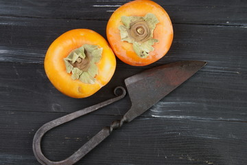 Persimmon on a wooden background