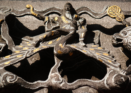 Man on eagle stone carving arts and decoration in downtown Taichung, Taiwan