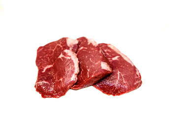 Marble beef eye of Round Steak on white background