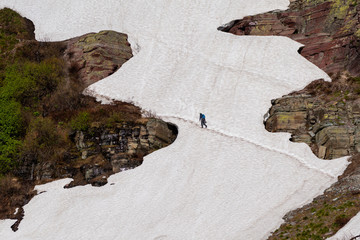 Man HIkes Across Ice Shelf