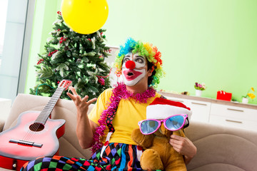 Funny clown in Christmas celebration concept 