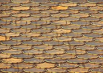texture of gilded metal tiles