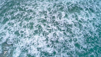 Fototapeta premium Drone aerial view of sea wave surface