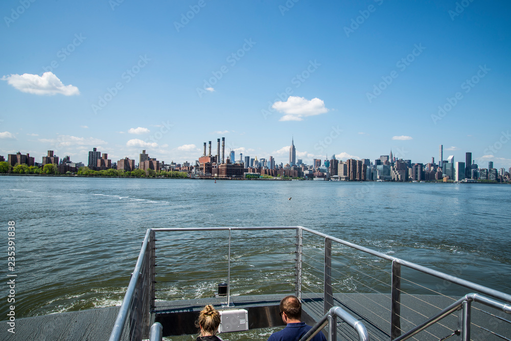 Poster riding a boat on the river