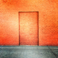 Red-Orange Brick Wall with Bricked-in Door