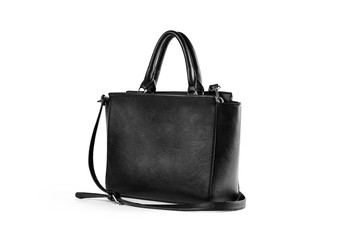 Women's leather black handbag. Close up. Isolated on white background.