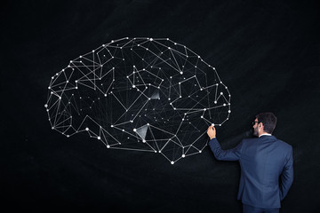 man drawing brain