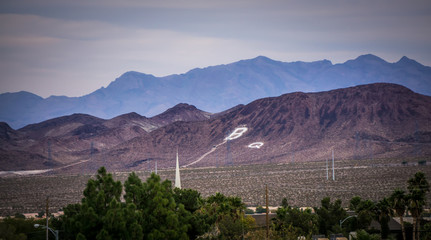 Las vegas city surrounded by red rock mountains and valley of fire © digidreamgrafix