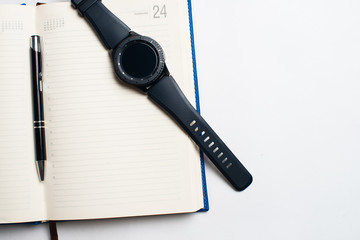 Notebook with glasses and pen, Book with glasses, Blue notebook with glasses, Book with cup of tea