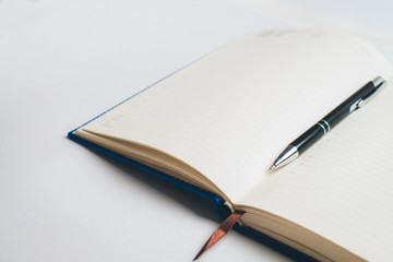 Notebook with glasses and pen, Book with glasses, Blue notebook with glasses, Book with cup of tea