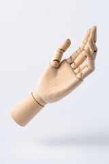 wooden raise hand with gesture isolated on white