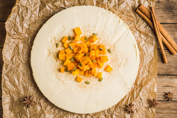 Fresh cheesecake on the rustic background. Selective focus. Shallow depth of field. 