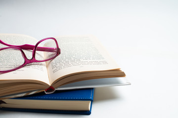 Notebook with glasses and pen, Book with glasses, Blue notebook with glasses, Book with cup of tea