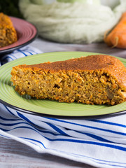 Spiced carrot cake with walnuts and cinnamon with breakfast setting background