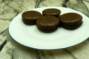 cookies with chocolate and chocolate coffee eating .