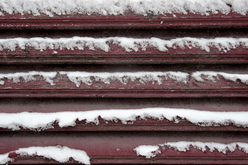 Wooden background with snow