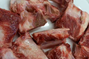 Healthy dog food on wooden background color,