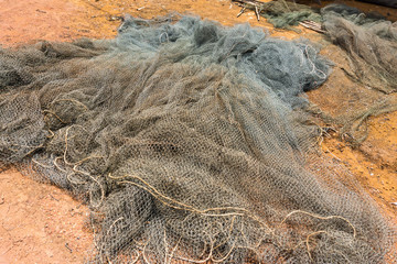 Fishing Net laying on the Ground in Kampong Phluk, Cambodia