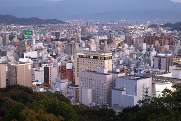 Obraz premium Cityscape of Matsuyama city in the evening ,Shikoku,Japan